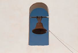 A bell with a rope attached